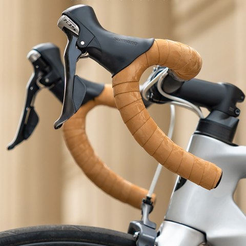 Owijka na kierownicę rowerową silikonowa perforowana - pomarańczowa